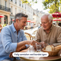 To mænd ved et cafébord