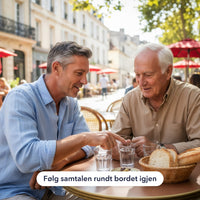 To menn rundt et kafébord
