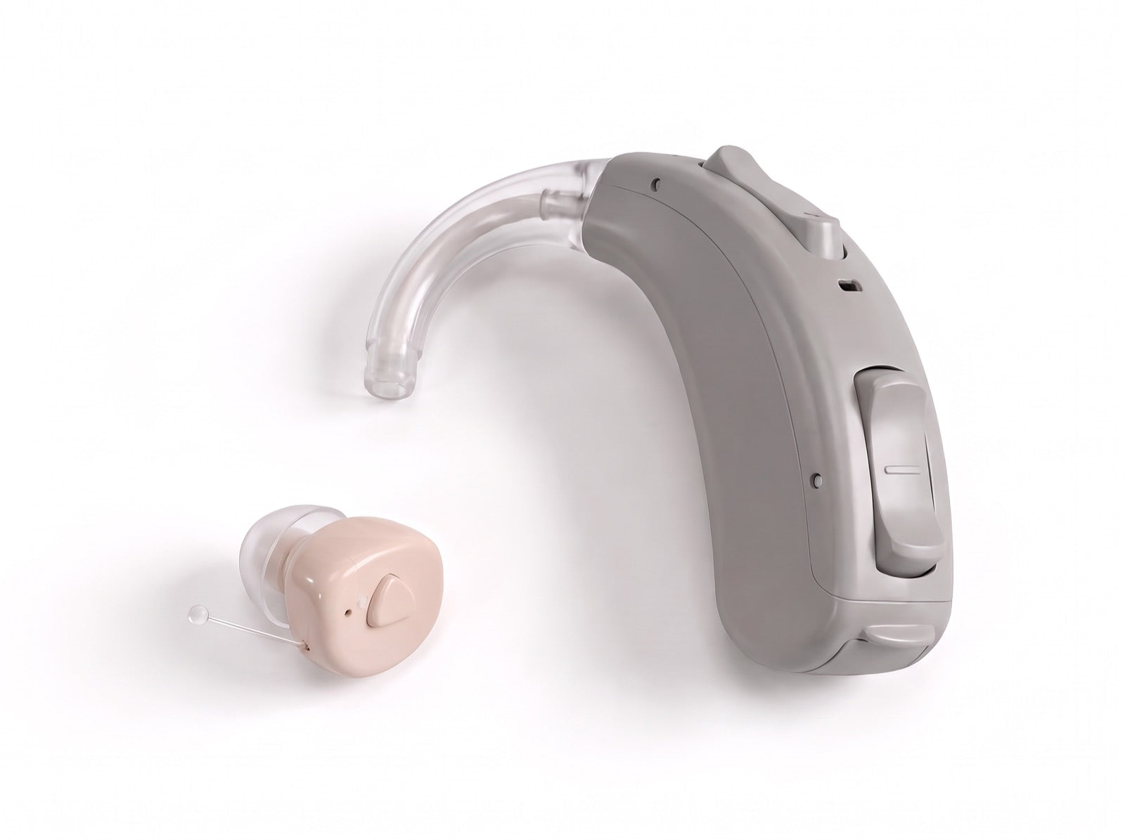 CLARIA Mini junto a un audífono retroauricular clásico